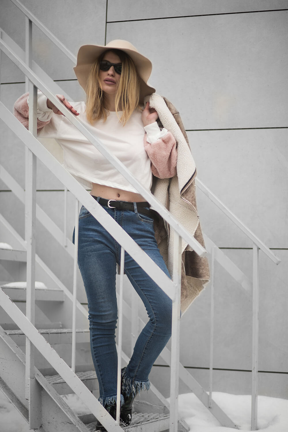 woman-in-white-crew-neck-long-sleeved-crop-top-and-blue
